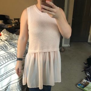 Sleeveless sweater with sheer bottom